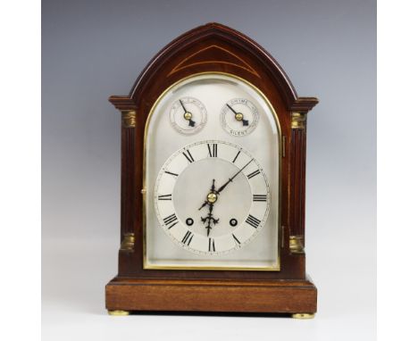 An early 20th century mahogany cased Westminster chime bracket clock, of lancet form, the 15cm silvered dial with subsidiary 