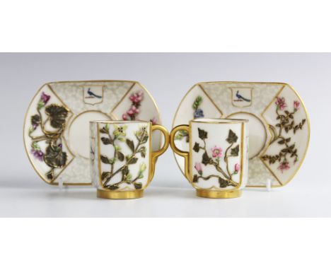 Two Royal Worcester 'Japan' teacups and saucers, late 19th century, each of canted square form, with relief moulded floral an