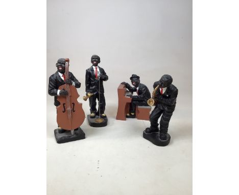 A vintage ceramic jazz band comprising four figures. Tallest figure 24cm