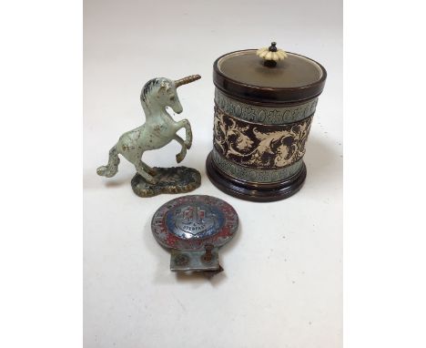 A brass lidded decorative ceramic jar also with a metal unicorn and a boys brigade badge. Jar H:14cm