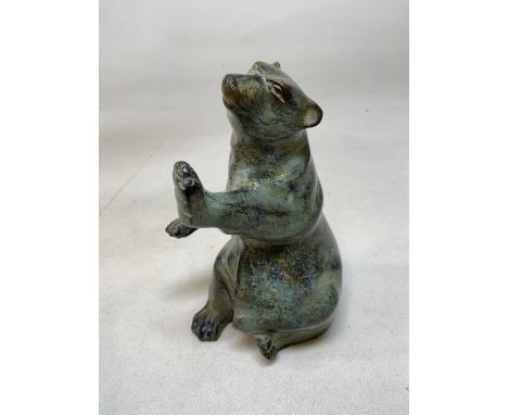 A ceramic study of a rearing bear H:17cm