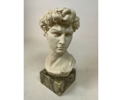 Heavy male portrait bust in the classical manner, presented upon solid marble base.