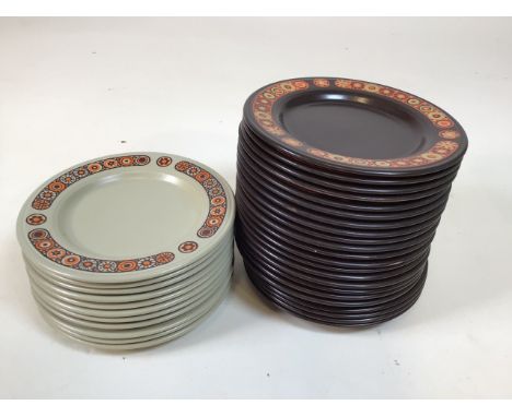 A large collection of Kiln Craft dark brown Hermes design ironstone pottery. Includes dinner plates, breakfast plates, side p