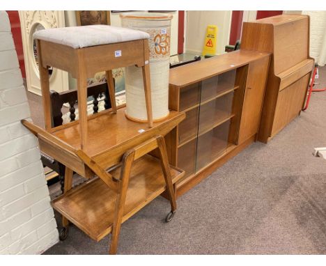 Teak two door bureau, teak sliding glazed door cabinet bookcase, dinner wagon, stool and ceramic stick stand (5).