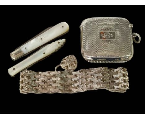 Silver vesta, Birmingham 1926, two mother of pearl folding knives, and silver bracelet (4).