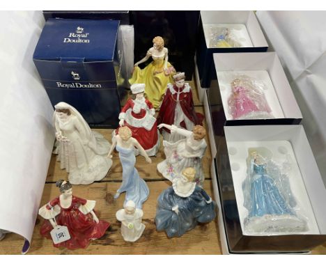 Collection of Royal Doulton and Royal Worcester figurines including Disney Princess, Queen Elizabeth II, etc (12).