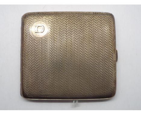 A George V silver cigarette case, Birmingham assay 1925, sponsors mark for Henry Williamson Ltd, approximately 99 grams / 3.1