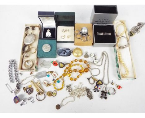 A collection of various costume jewellery with some silver / white metal to include locket, rings, necklaces and similar.