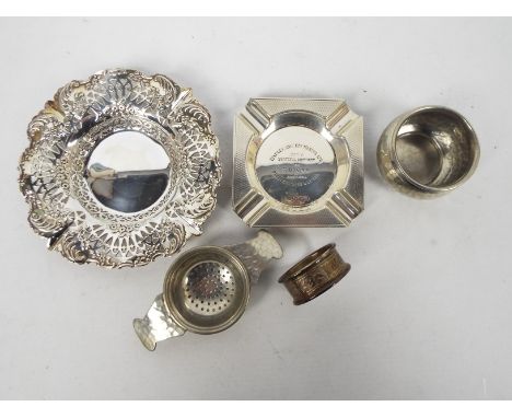 Silver Group - Two hallmarked silver ashtrays and a silver napkin ring, various assay and date marks, also included in the lo