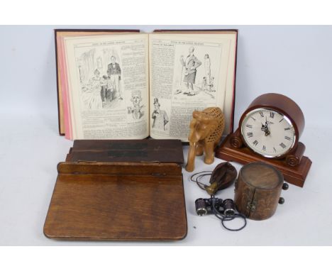 A mixed lot to include a mantel clock, vintage purse, opera glasses, carved wooden elephant and similar