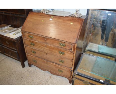 A Georgian mahogany bureau fitted four long drawers