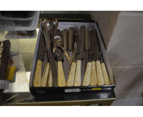 A tray containing silver handled knives; bone handled forks; a silver plated ladle etc.