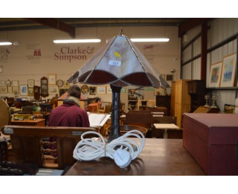 A Tiffany style table lamp and shade