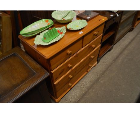 A modern pine chest fitted two short over three long drawers