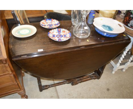 An oak gate leg dining table 