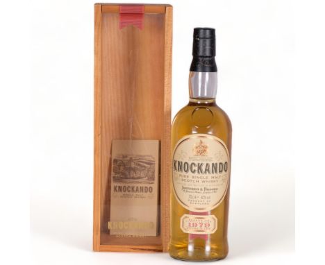 Knockando Pure Single Malt Scotch Whisky,Season of distillation 1979, 70cl, 40% vol., wooden presentation box with leaflet. 