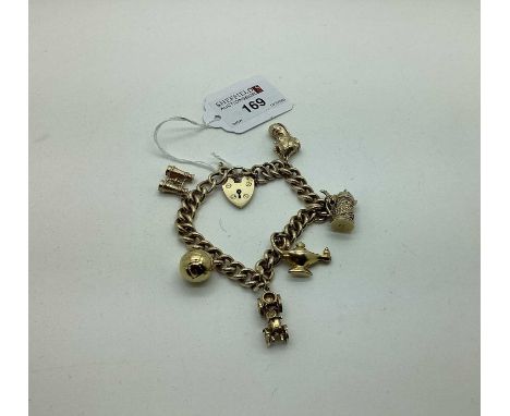 A 9ct Gold Curb Link Charm Bracelet, to a 9ct gold heart shape padlock style clasp, suspending novelty charm pendants, includ