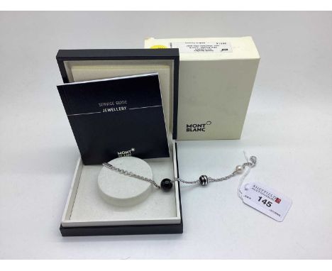 Montblanc; A Modern Pearl and Onxy Bracelet, (38516) stamped "925", in original box with booklet. [824000]