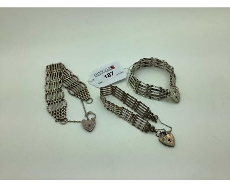 A Fancy Gate Link Style Bracelet, to hallmarked silver heart shape padlock style clasp; together with two further gate link s