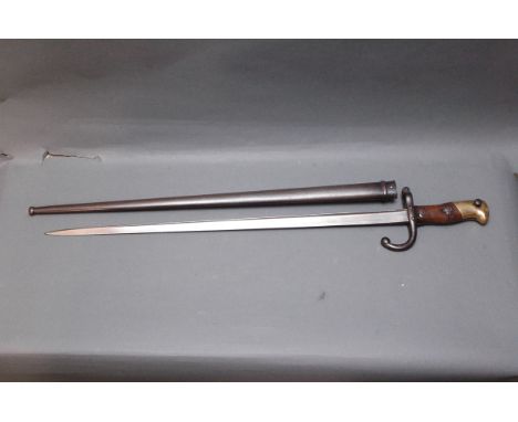 French T-Back sword bayonet for use on 11 mm Gras rifle, spine marked "St. Etienne 1876".  Blade length 52 cm, overall length