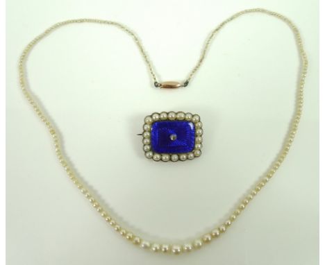 A 14ct gold, blue enamel, diamond and seed pearl brooch of rectangular form with guilloche enamel with seed pearl border and 