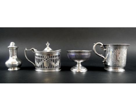 A collection of silver items including a christening tankard, the body engraved with floral medallions flanking the initials 