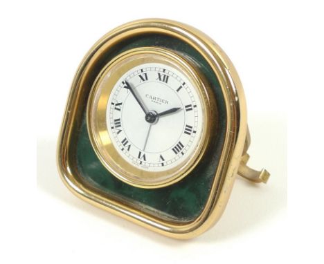 A Cartier 8-day French manual wind desk or travel clock, from Les Must de Cartier collection, late 20th century, the brass ca