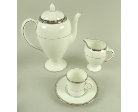 A Wedgwood coffee service, in Carlyn pattern, comprising six coffee cans, 7.5 by 6cm, six saucers, 12.5cm, coffee pot, 19 by 