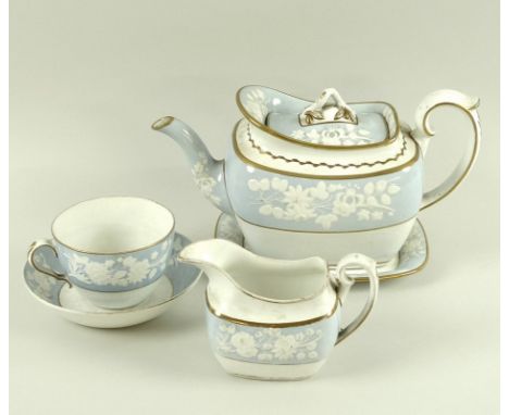 A Spode part tea service, circa 1820, pattern number 2036, with lilac bands moulded in white relief with floral sprigs, and h