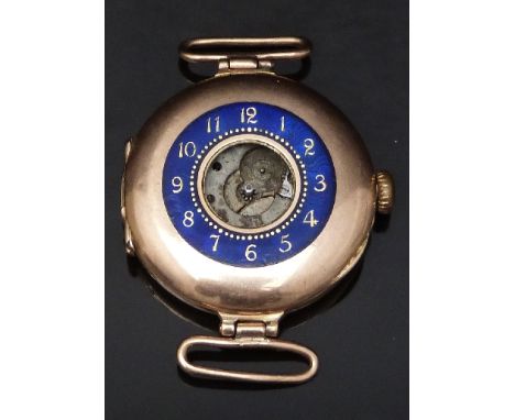 9ct gold ladies half hunter wristwatch with gold inlaid Arabic numerals to the blue enamel chapter ring, case diameter 26mm, 