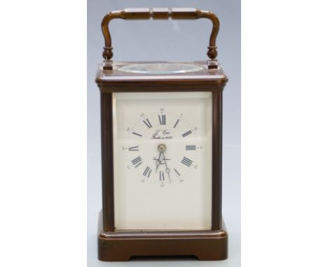 20thC L'Epee French brass carriage clock with enamalled Roman and Arabic dial, blued Breguet style hands and corniche style c