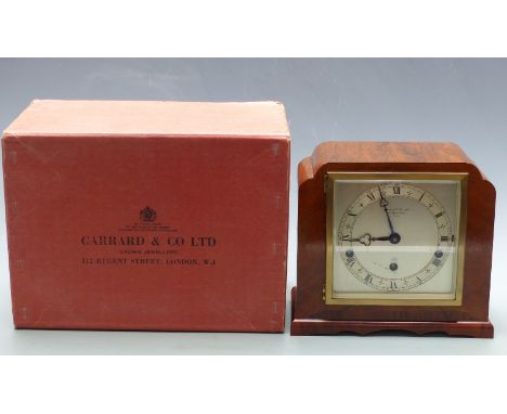 Elliott walnut cased mantel clock with Garrard and Co. to silvered Roman dial, trefoil hands and three train movement with We