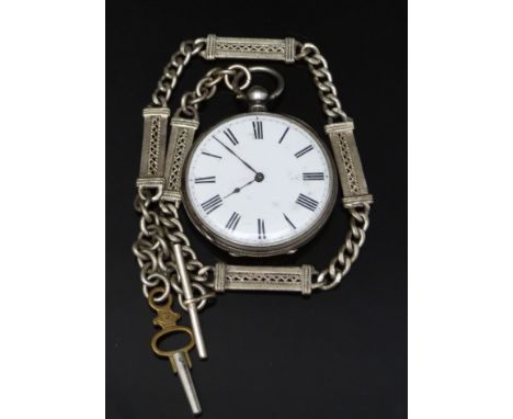 Continental silver pocket watch marked 'Fine Silver' with black Roman numerals, white enamel dial and engine turned case, on 