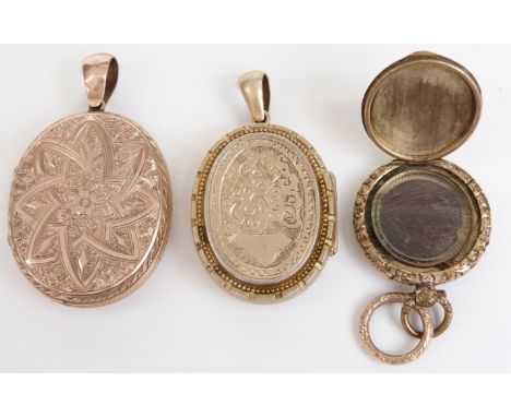 Victorian locket with engraved floral decoration, 3.5cm, Victorian locket, 3cm long, and a circular Victorian mourning locket