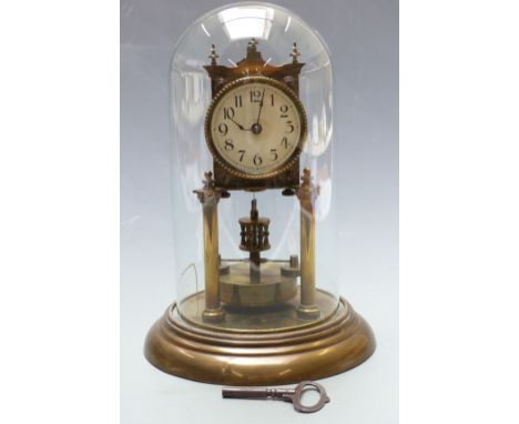 Anniversary clock with key wind movement numbered 22272, under glass dome, 28cm tall&nbsp;