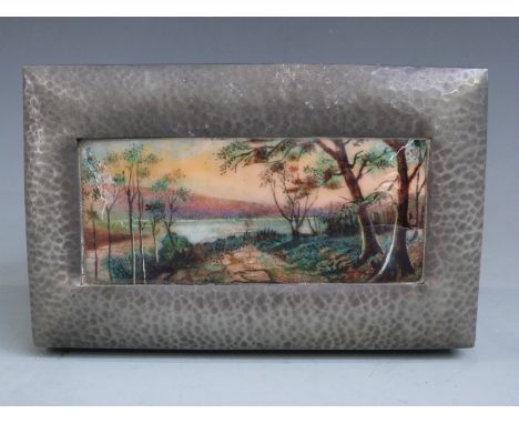 Tudric Pewter and enamel box with hinged lid, likely for Liberty and Co. The inset enamel copper plaque decorated with a lake
