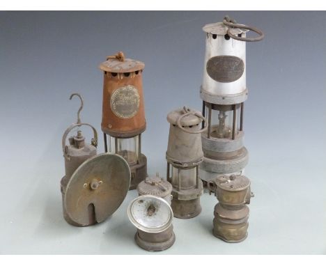 Six various miner's lamps including Spiralarm type S, Protector Lamp &amp; Lighting Co Ltd, Baby Wolf lamp, Wakow etc