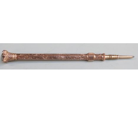 Yellow metal propelling pencil with hardstone finial, marked E.B 9ct, length when extended 13.5cm, weight 18.0g