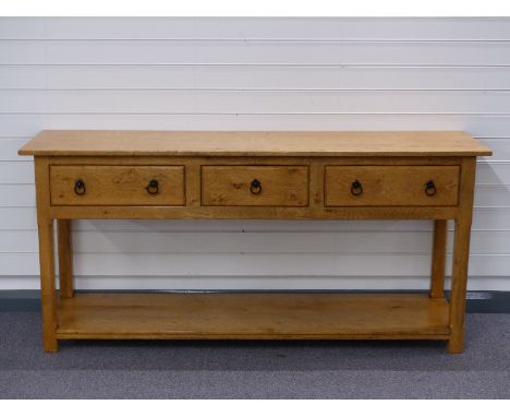 Light oak or elm dresser with three drawers above shelf, W173 x D46 x H82cm