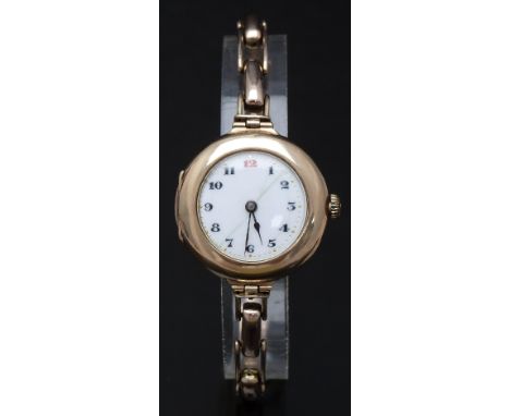 Rolex 9ct gold ladies wristwatch with blued hands, Arabic numerals, gilt minute markers, white enamel dial and signed 15 jewe