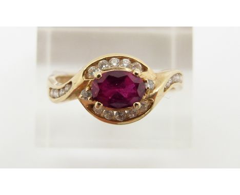 A 14ct gold ring set with synthetic ruby and cubic zirconia, 3.6g, size T