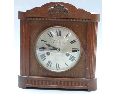 Wurttemberg oak cased mantel clock with reeded decoration to case, Kemp Brothers, Union St. Bristol to silvered Roman dial an