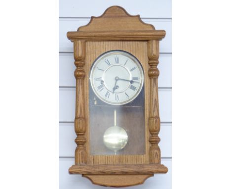 Light oak three train German wall clock with Roman dial, striking the quarters on chimes, 50cm tall