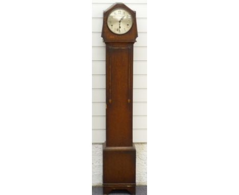 An oak cased three train granddaughter clock with three train movement, 135cm tall