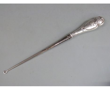William Cummings silver hallmarked boot button hook, London 1895, the steel hook leading to a silver handle embossed with put