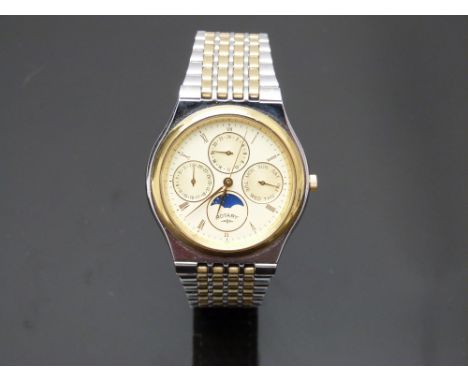 Rotary triple calendar gentleman's wristwatch with inset day and date dials, moonphase, gold Roman numerals, gold bezel, stai