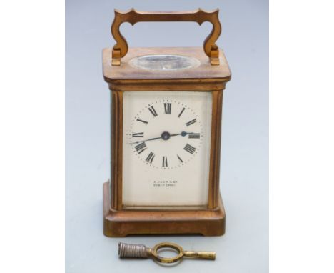 20thC French brass carriage clock. A Jack &amp; Co., Cheltenham&nbsp; to enamelled Roman dial, blued steel hands, corniche st