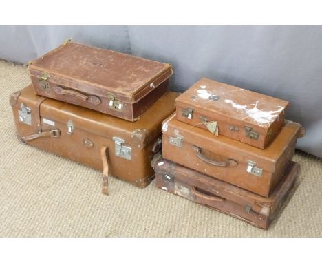 Five vintage leather suitcases, largest W82cm