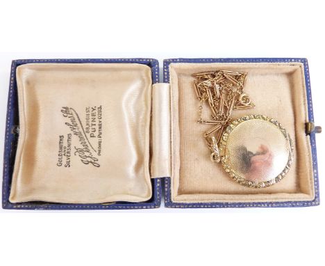 A 9ct gold necklace and Victorian locket with engine turned decoration and textured border, 2.5cm long