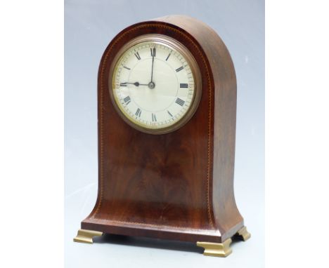 French late Victorian mantel clock in inlaid flame mahogany arch topped case with flared base, 21cm tall